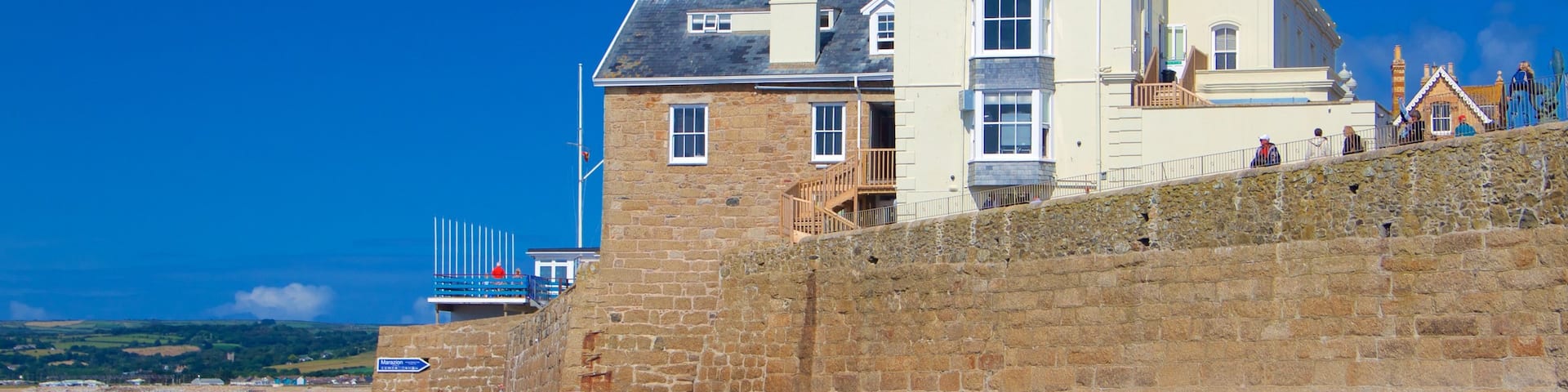 Marazion showing a sandy beach, general coastal views and a house