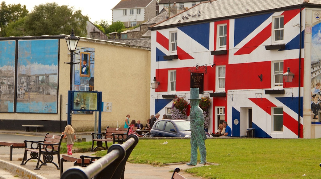 Saltash which includes a square or plaza and a statue or sculpture