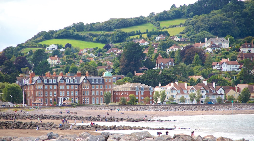 Minehead which includes a sandy beach, a coastal town and general coastal views