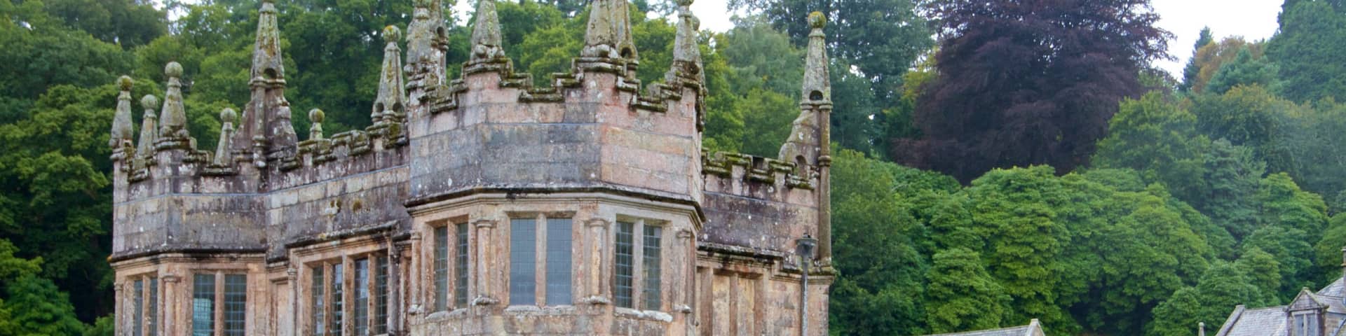 Lanhydrock featuring a garden, heritage architecture and chateau or palace