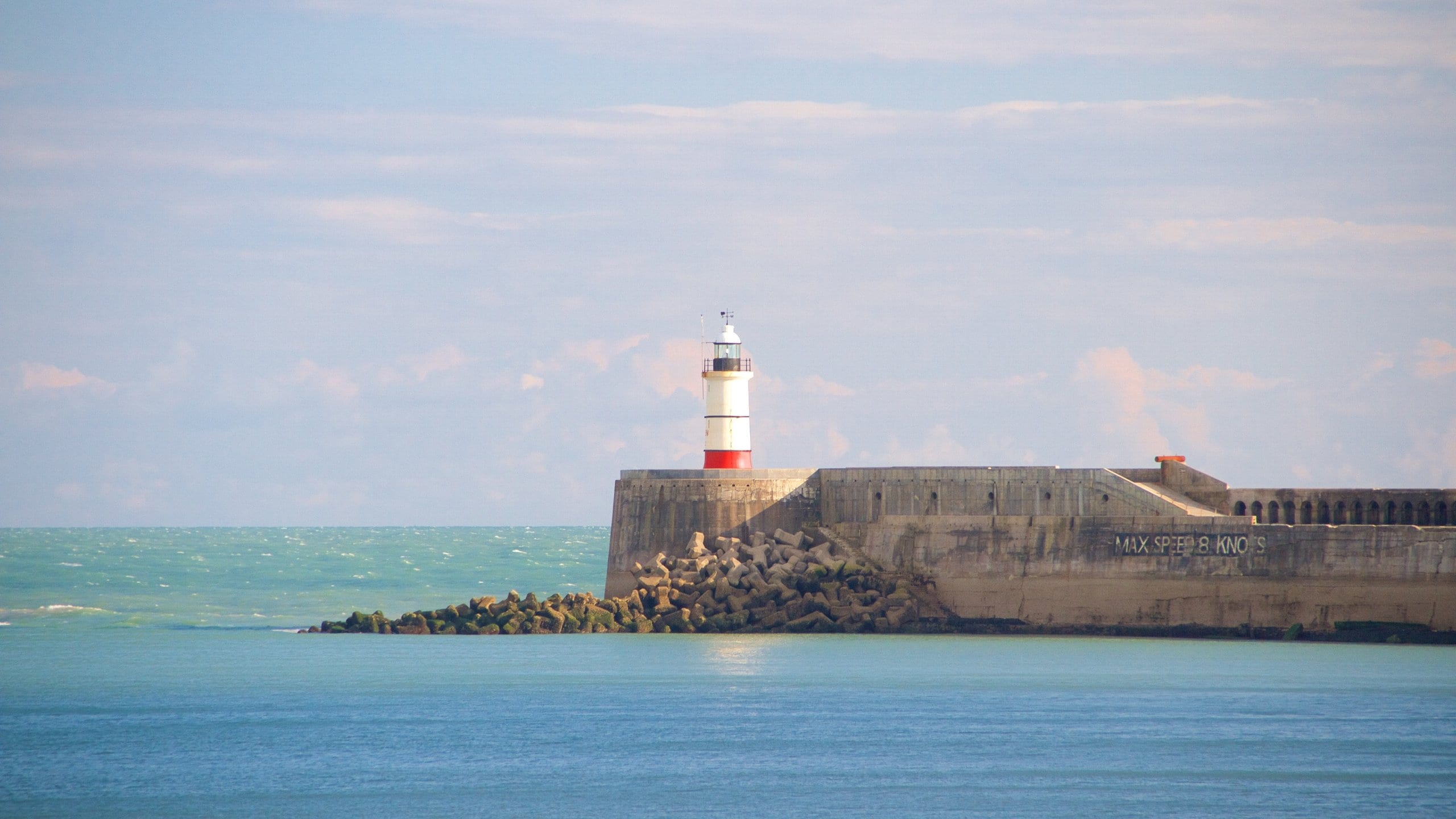 Brighton featuring general coastal views, rugged coastline and a lighthouse