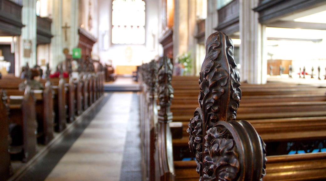 Church of St. Mary the Great which includes a church or cathedral, interior views and religious elements