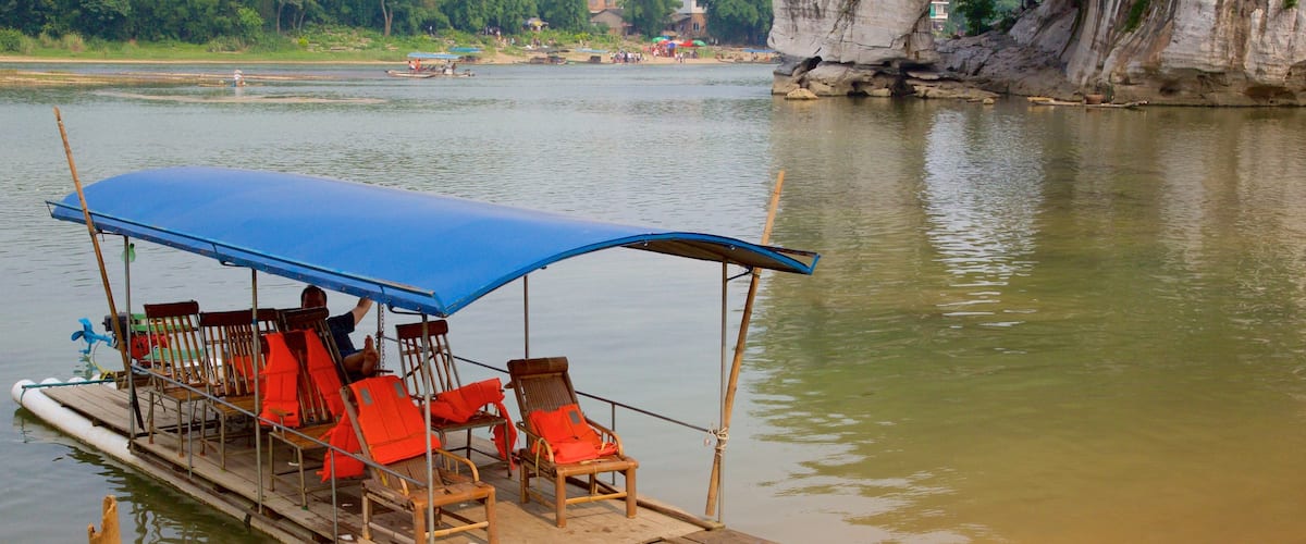 Elephant Trunk Hill featuring a ferry