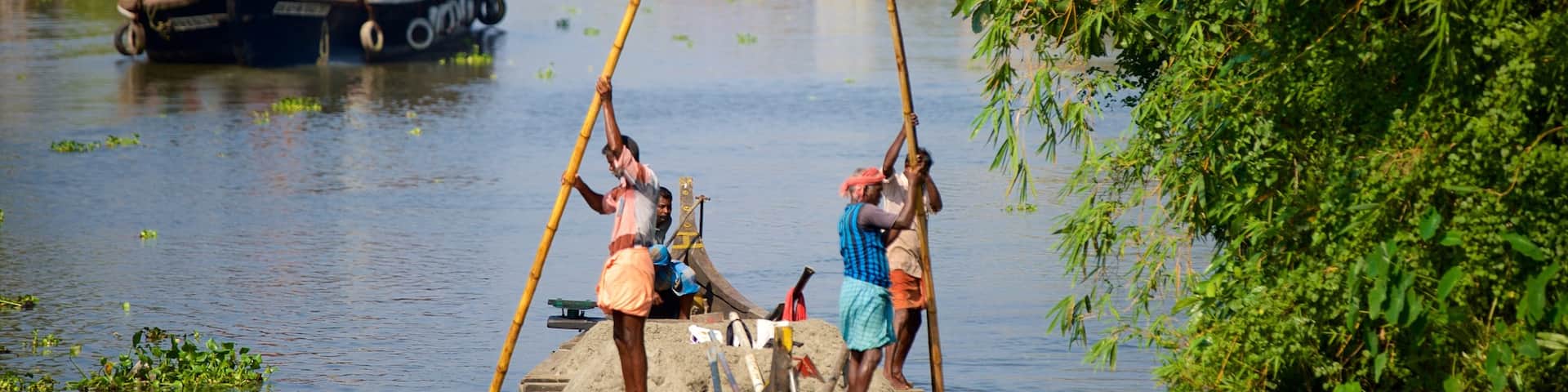 Alappuzha District showing a river or creek and kayaking or canoeing