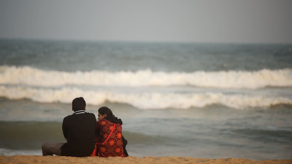 Praia de Elliot caracterizando uma praia assim como um casal