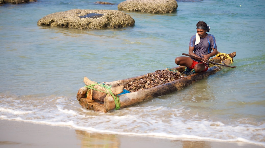 Hawah Beach featuring a beach as well as an individual male