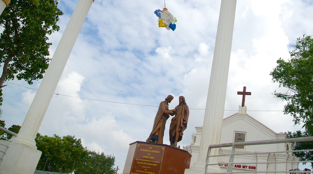 Chennai featuring a church or cathedral and a statue or sculpture