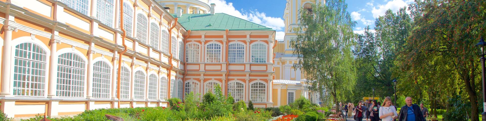 Alexander Nevsky Lavra featuring a park and heritage architecture as well as a small group of people