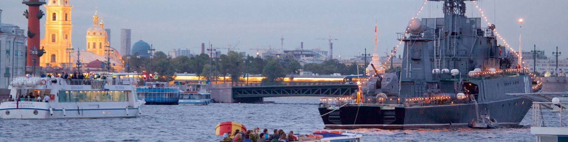 Peter and Paul Fortress showing a ferry and a river or creek
