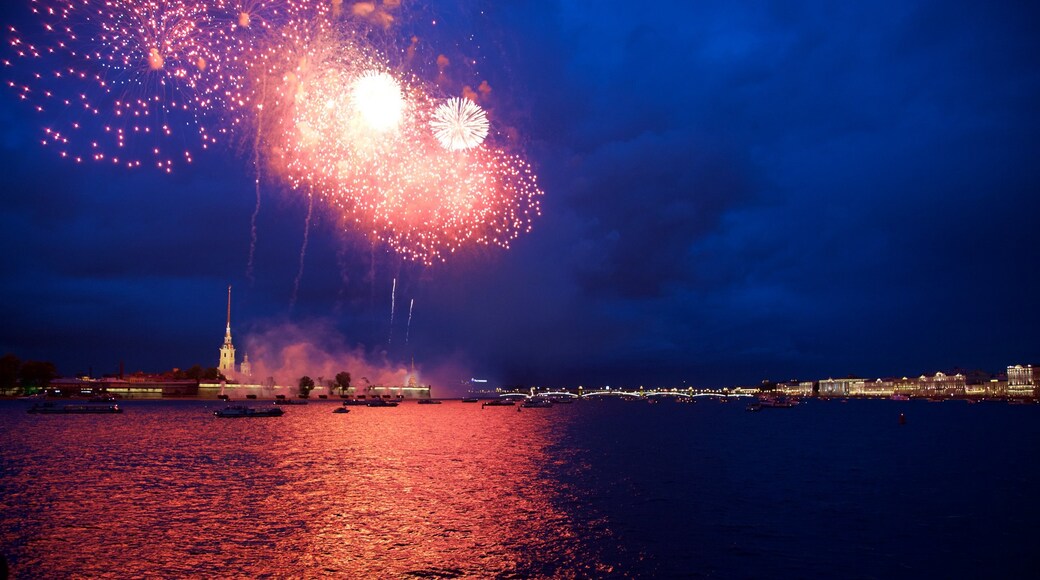 Strelka showing night scenes and a bay or harbour