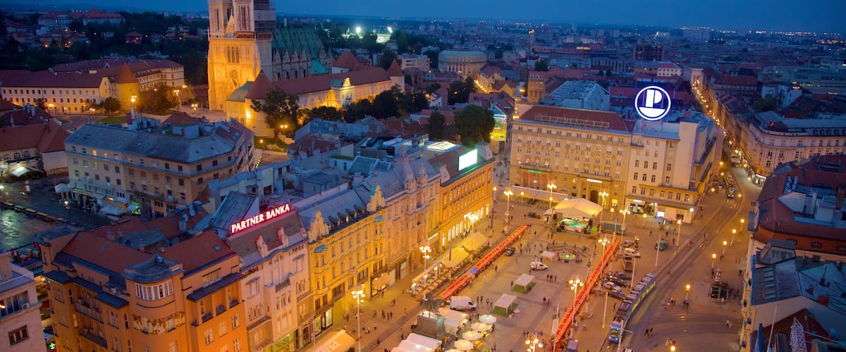 Ban Jelacic Square which includes a city and night scenes