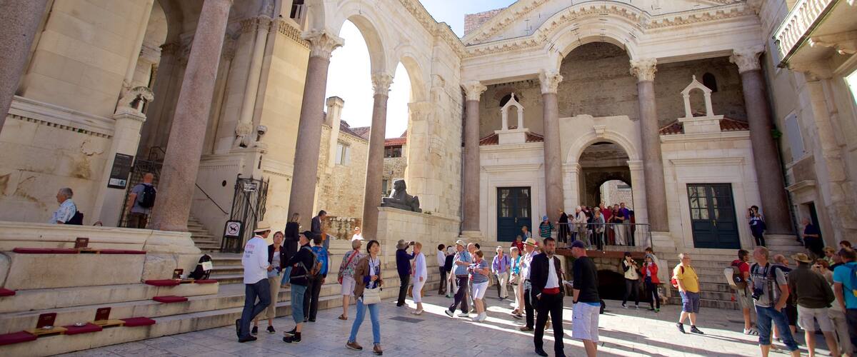 Diocletian\'s Palace which includes a square or plaza as well as a large group of people