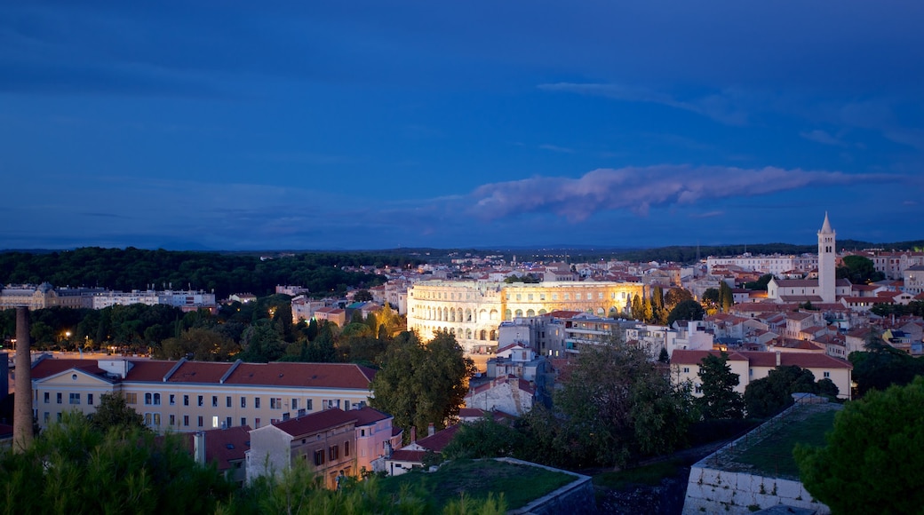 Pula which includes a city and night scenes