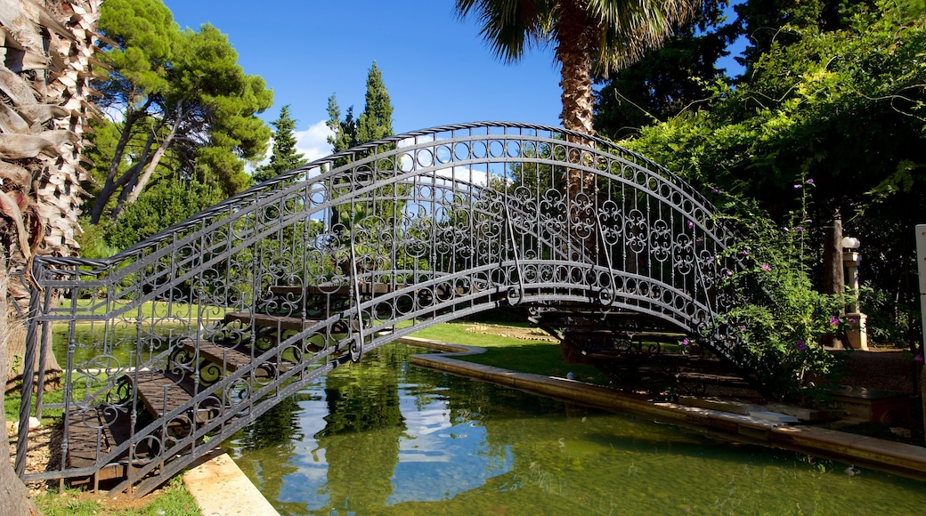 Katarina Island featuring a pond and a bridge