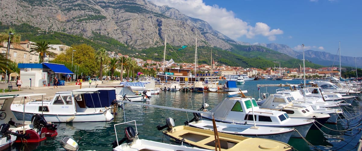 Makarska featuring mountains and a marina