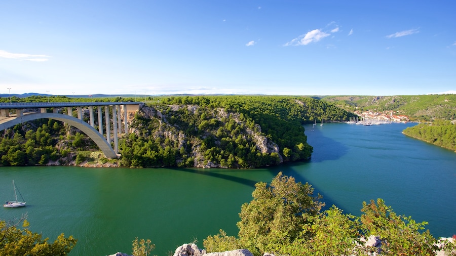 Krka National Park which includes a bridge and a river or creek