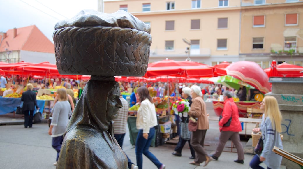 Dolac which includes markets and a statue or sculpture