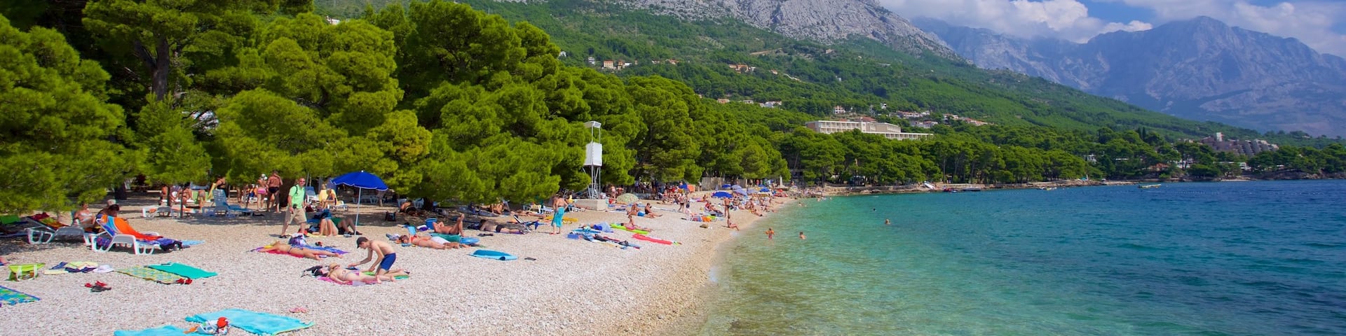 Brela Beach which includes a pebble beach and mountains