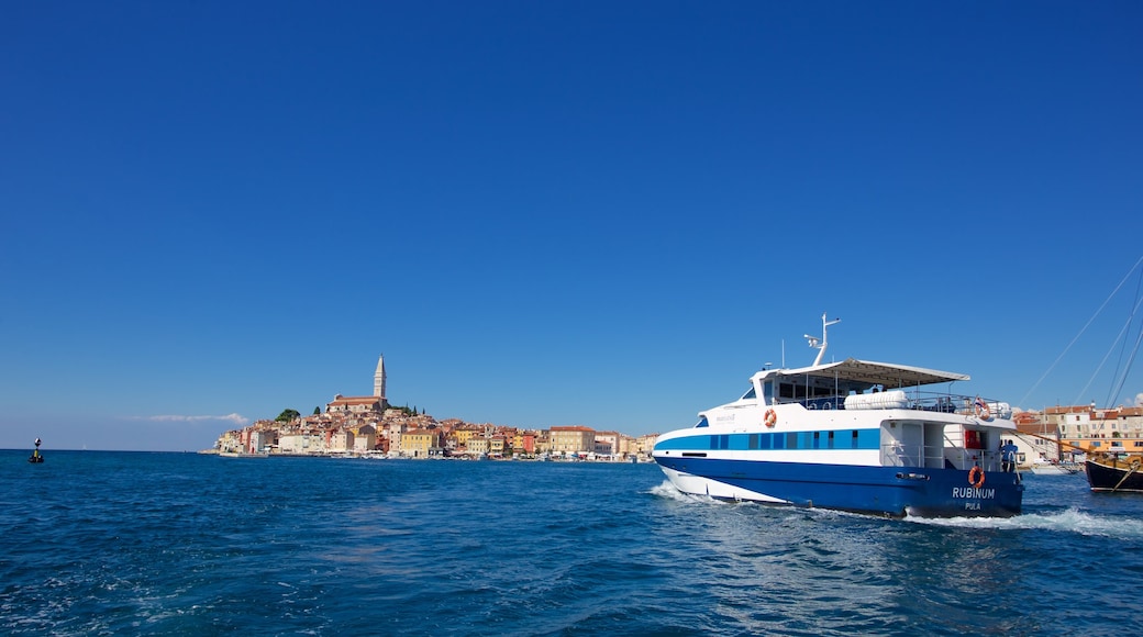 Rovinj Harbour showing boating and a bay or harbor