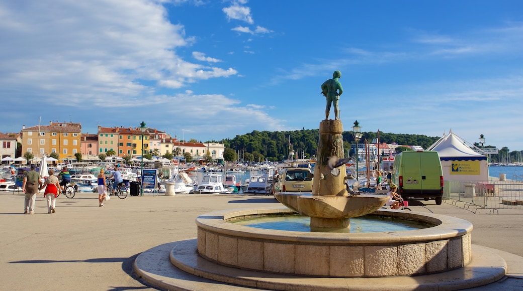 Trg Marsala Tita showing a bay or harbour and a fountain