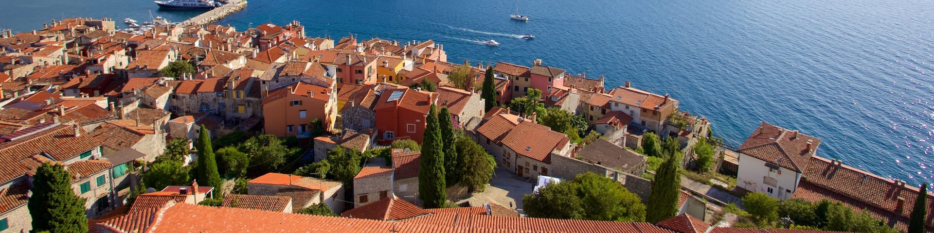 Katarina Island which includes island images and a coastal town