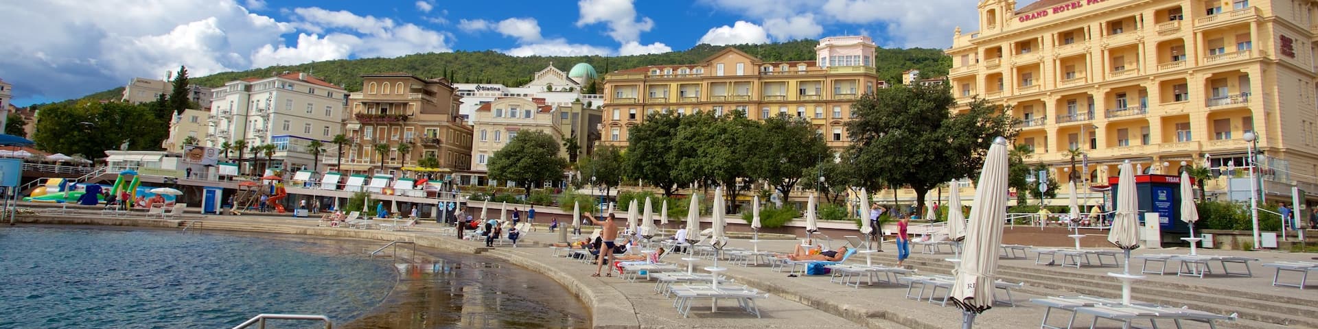 Slatina Beach which includes general coastal views and a coastal town
