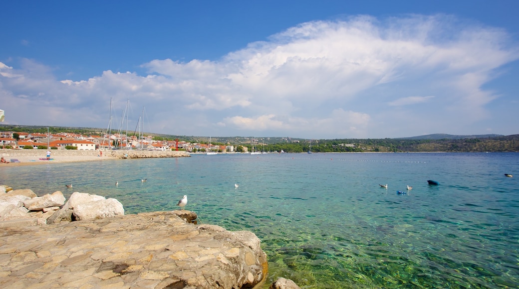 Primosten Beach featuring rocky coastline and a coastal town