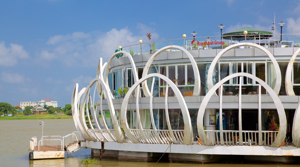 Hue showing modern architecture, a city and a lake or waterhole