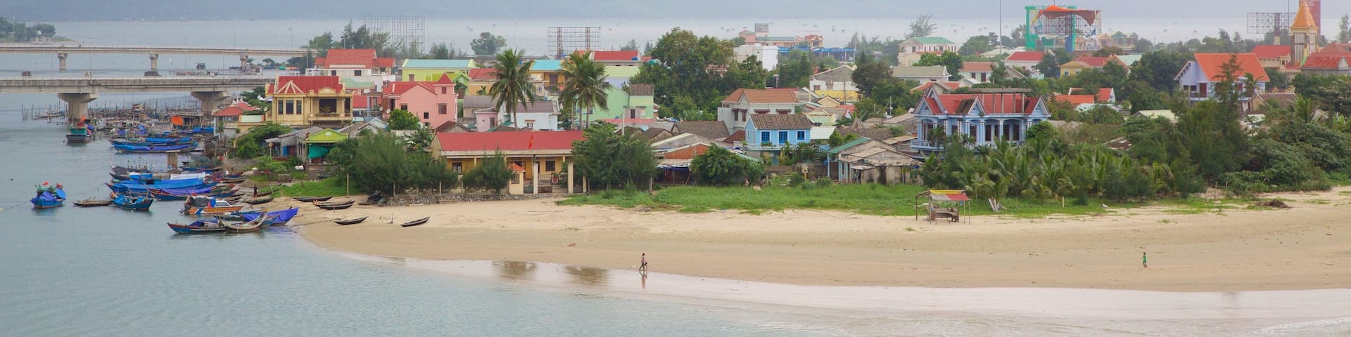 Lang Co which includes general coastal views, mist or fog and a sandy beach