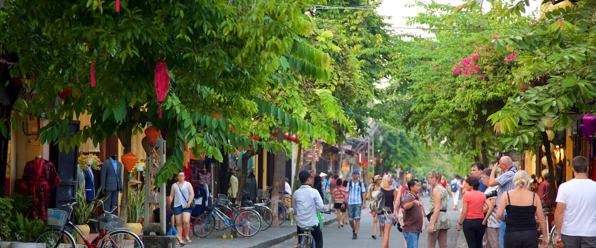 Hoi An Ancient Town which includes cycling, street scenes and a small town or village