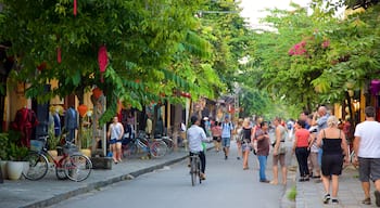 Hoi An Ancient Town which includes cycling, street scenes and a small town or village