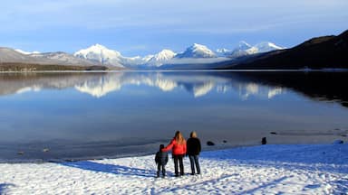 Whitefish which includes a lake or waterhole, mountains and landscape views