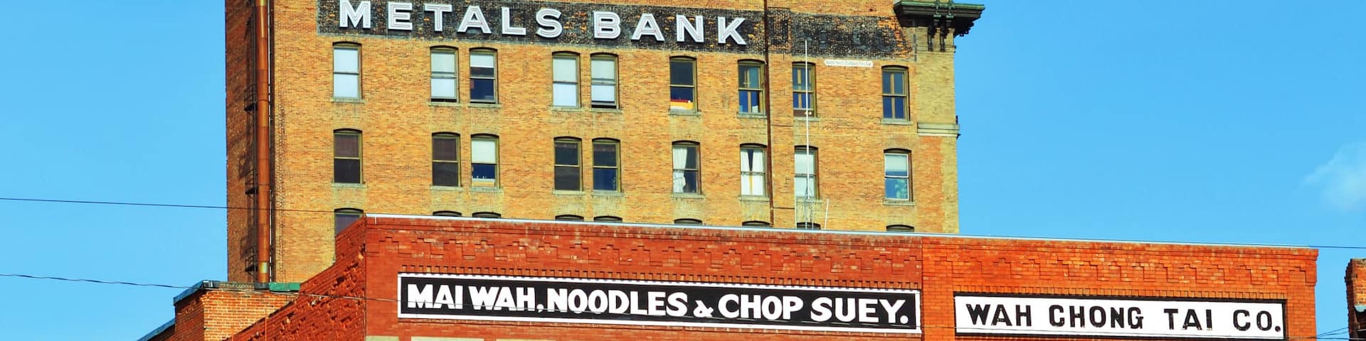 Butte featuring heritage architecture and signage