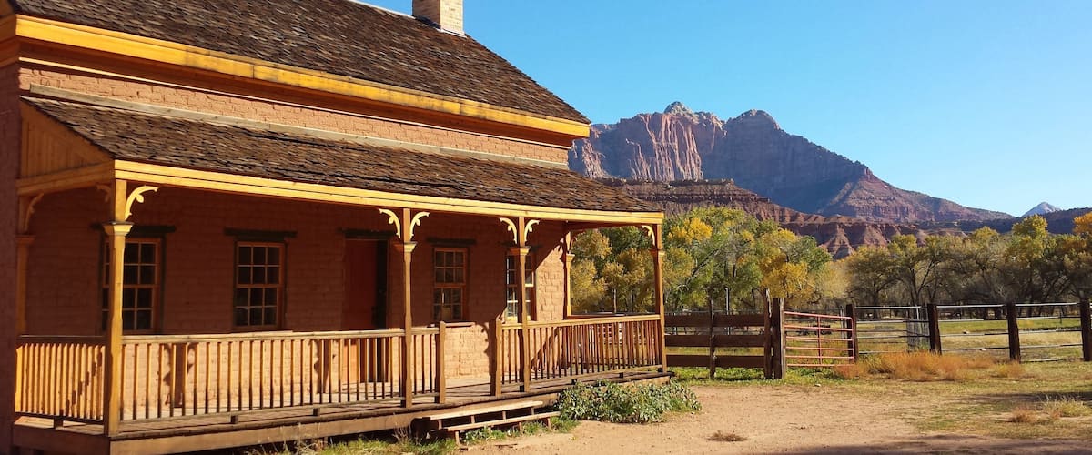 Springdale which includes a house and a gorge or canyon
