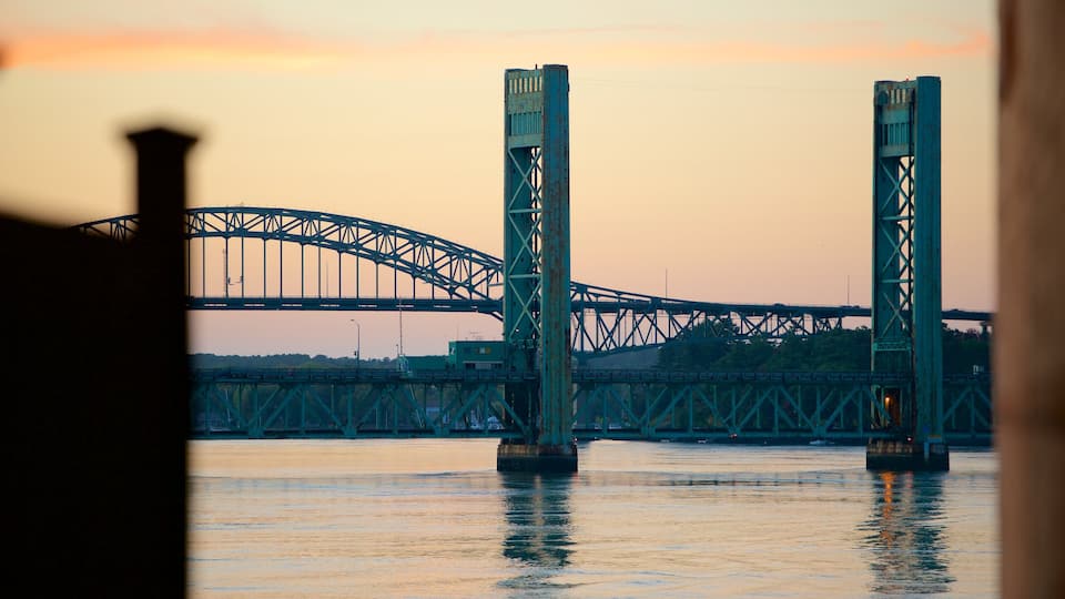 Portsmouth showing a river or creek, a sunset and a bridge