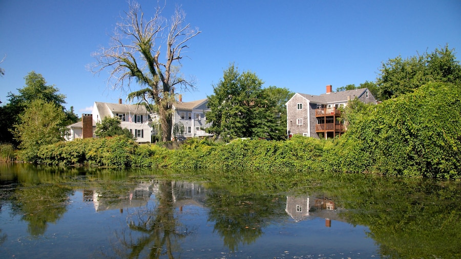 Jenney Grist Mill which includes a house and a river or creek