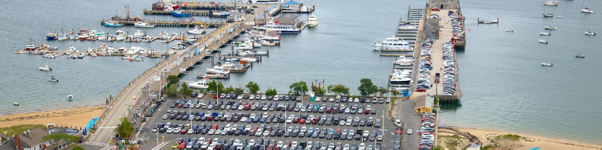 Pilgrim Monument which includes a bay or harbor and general coastal views