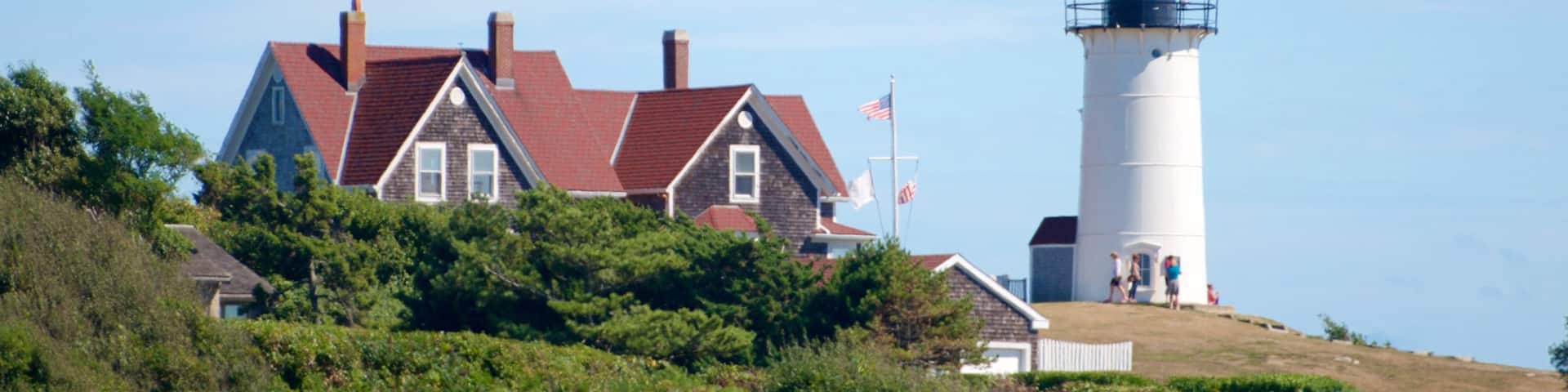Nobska Lighthouse showing a house, a lighthouse and general coastal views