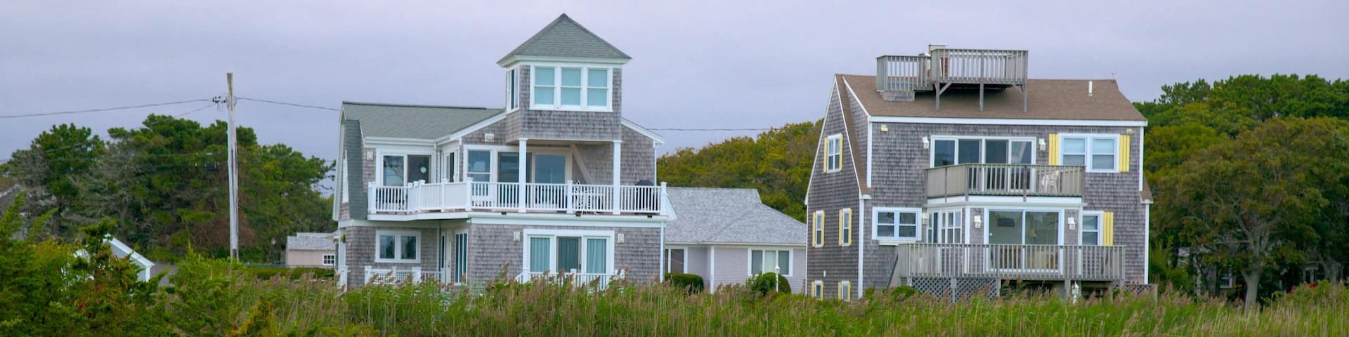 Kalmus Beach showing a lake or waterhole and a house