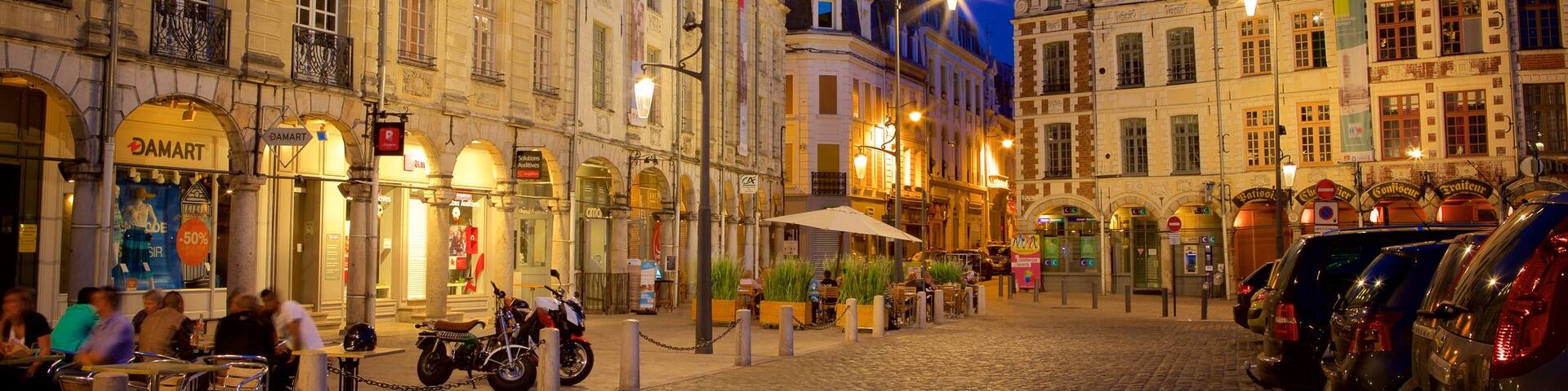 Place des Heros which includes night scenes, heritage elements and heritage architecture