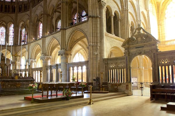 St. Remi Basilica which includes a church or cathedral and interior views