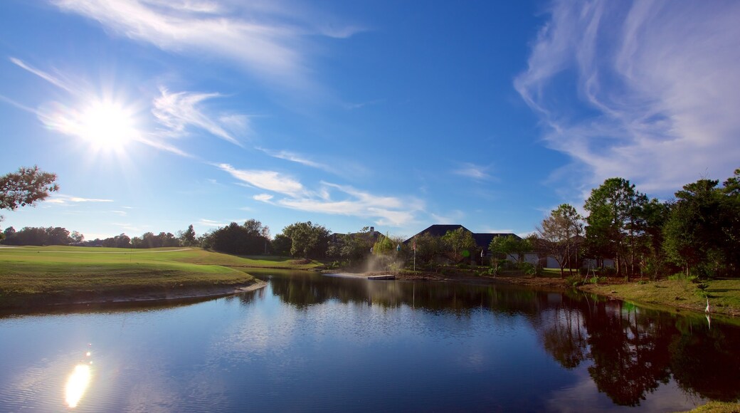 Upper Grand Lagoon showing a pond and golf