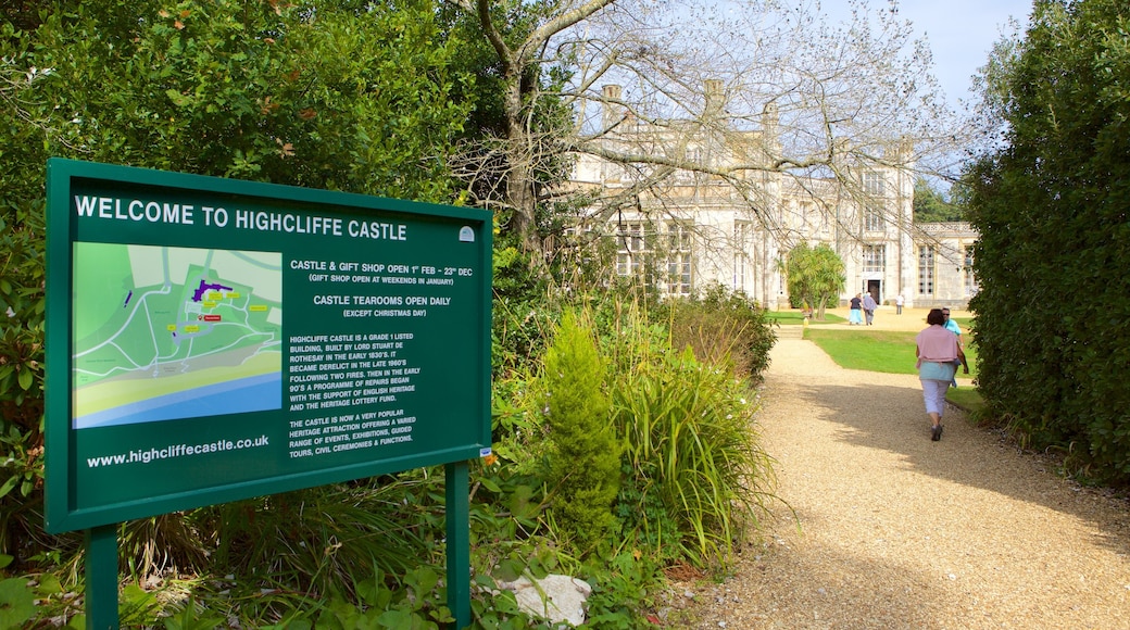 Highcliffe Castle featuring signage and a park