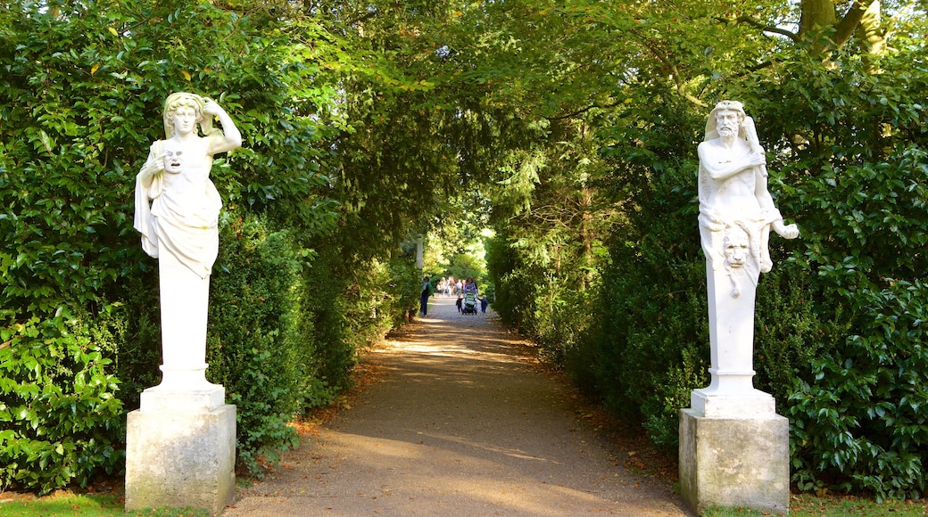 Anglesey Abbey which includes a statue or sculpture