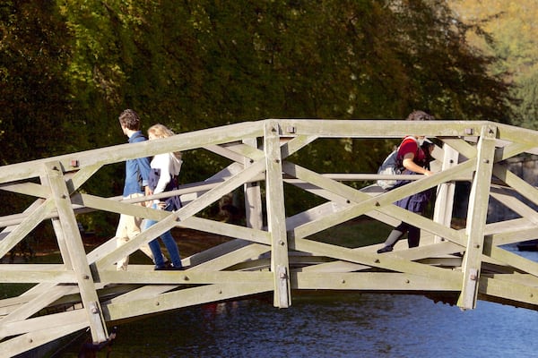 Mathematical Bridge featuring a bridge as well as a small group of people