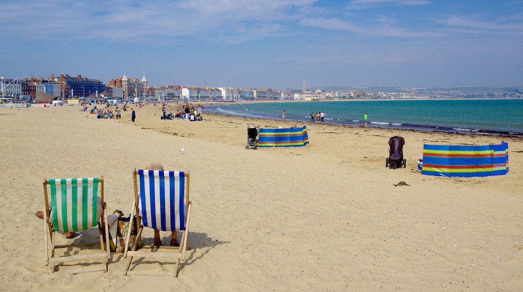Playa de Weymouth que incluye una playa de arena