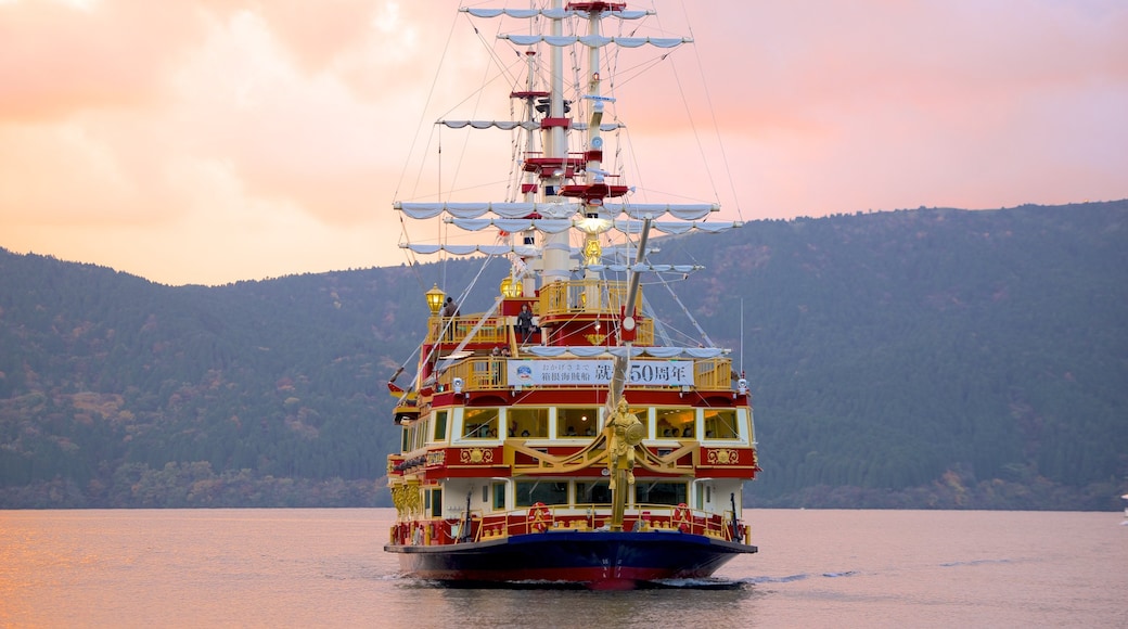 Lake Ashi showing a sunset, a lake or waterhole and sailing