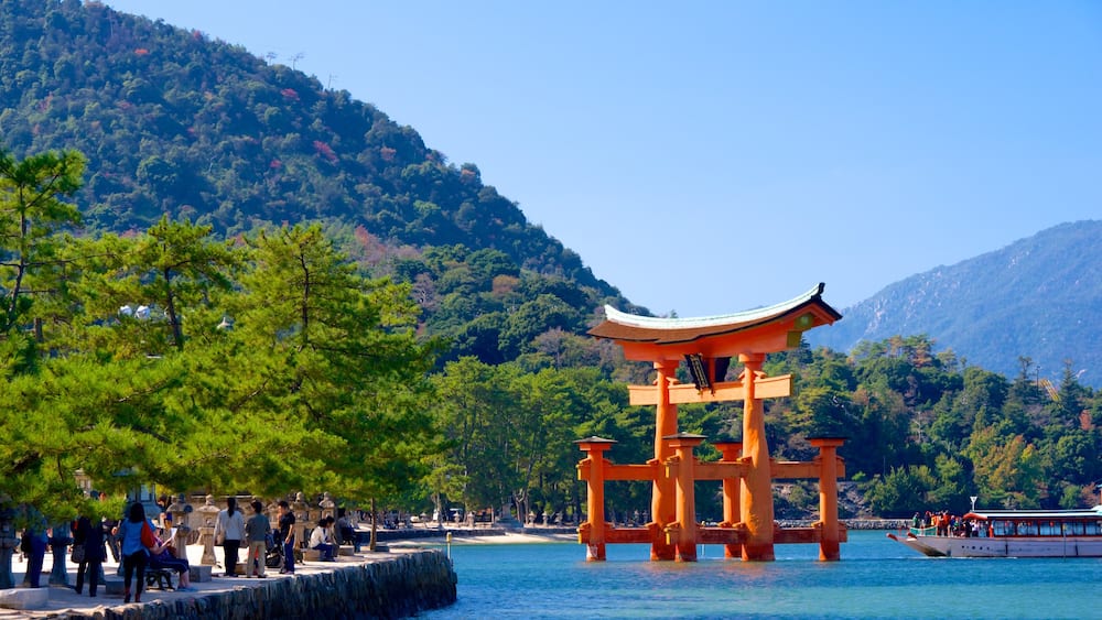 Itsukushima Shrine which includes mountains and heritage elements