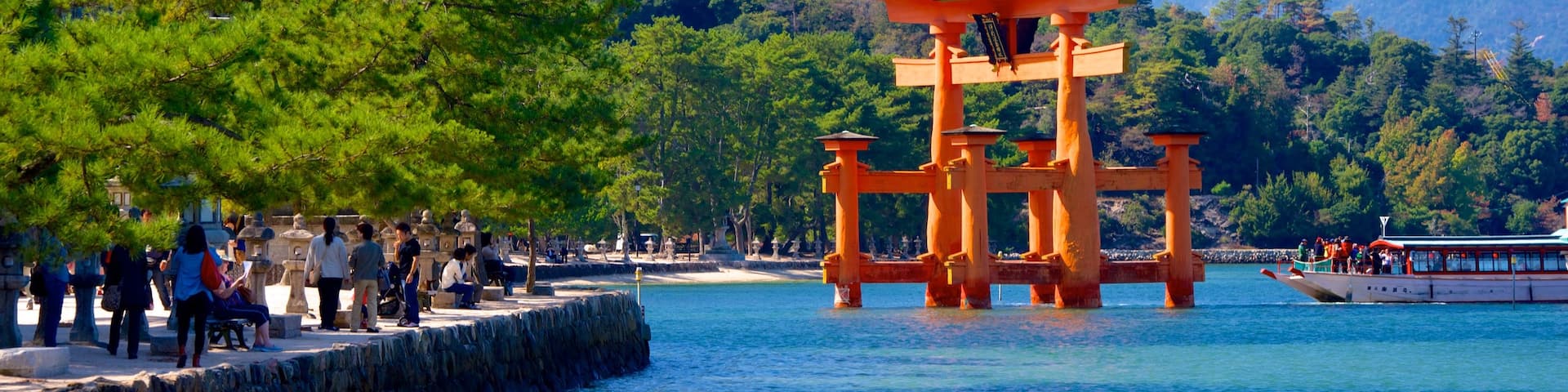 Itsukushima Shrine showing mountains and heritage elements