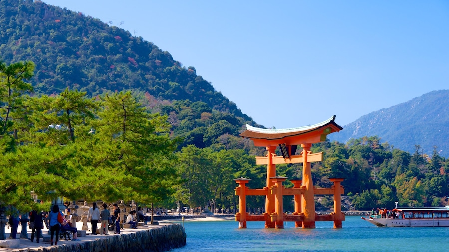 Itsukushima Shrine which includes heritage elements and mountains